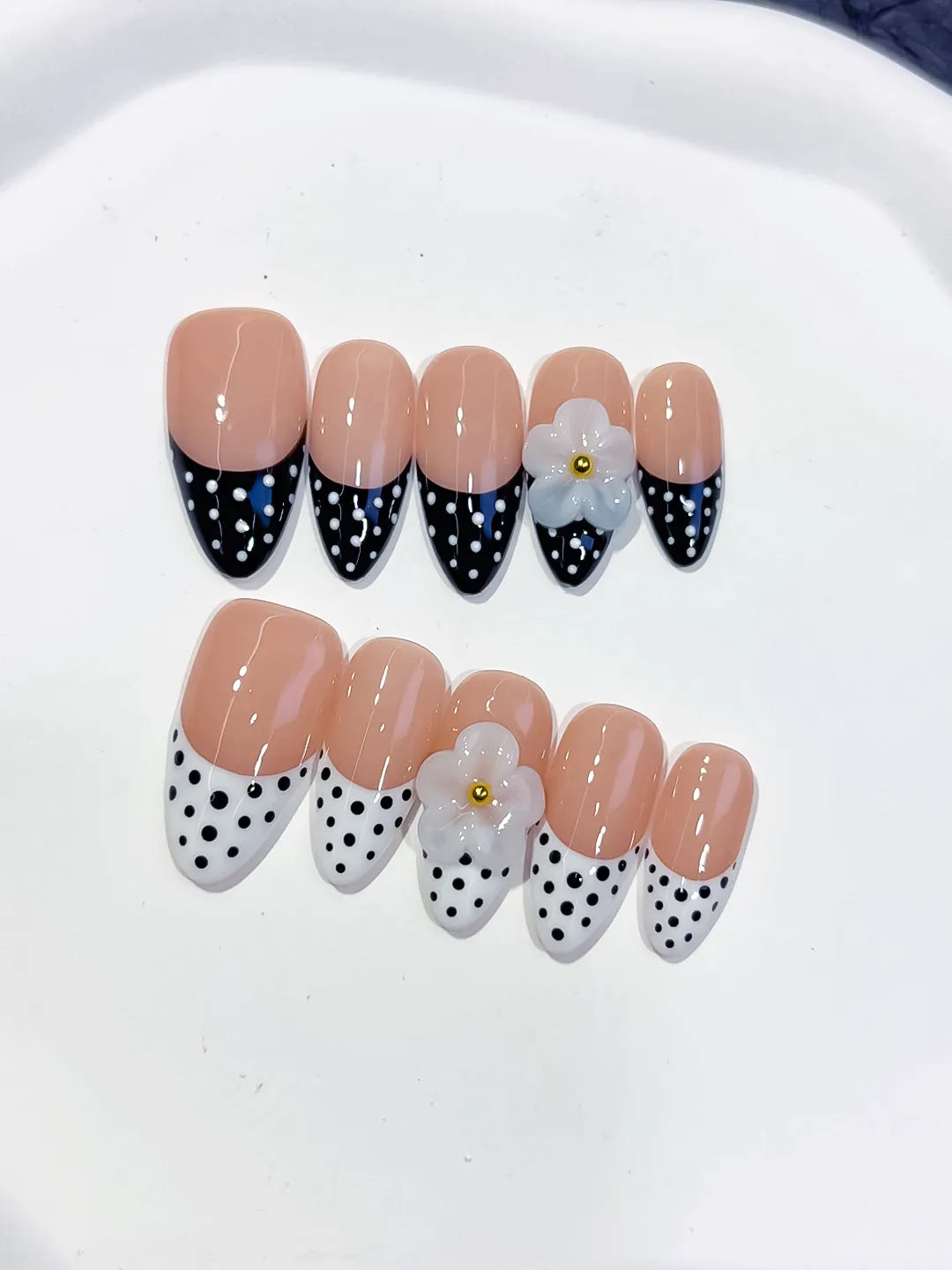 D557 - Medium Nude Black Almond French tip Flower Dot Pattern