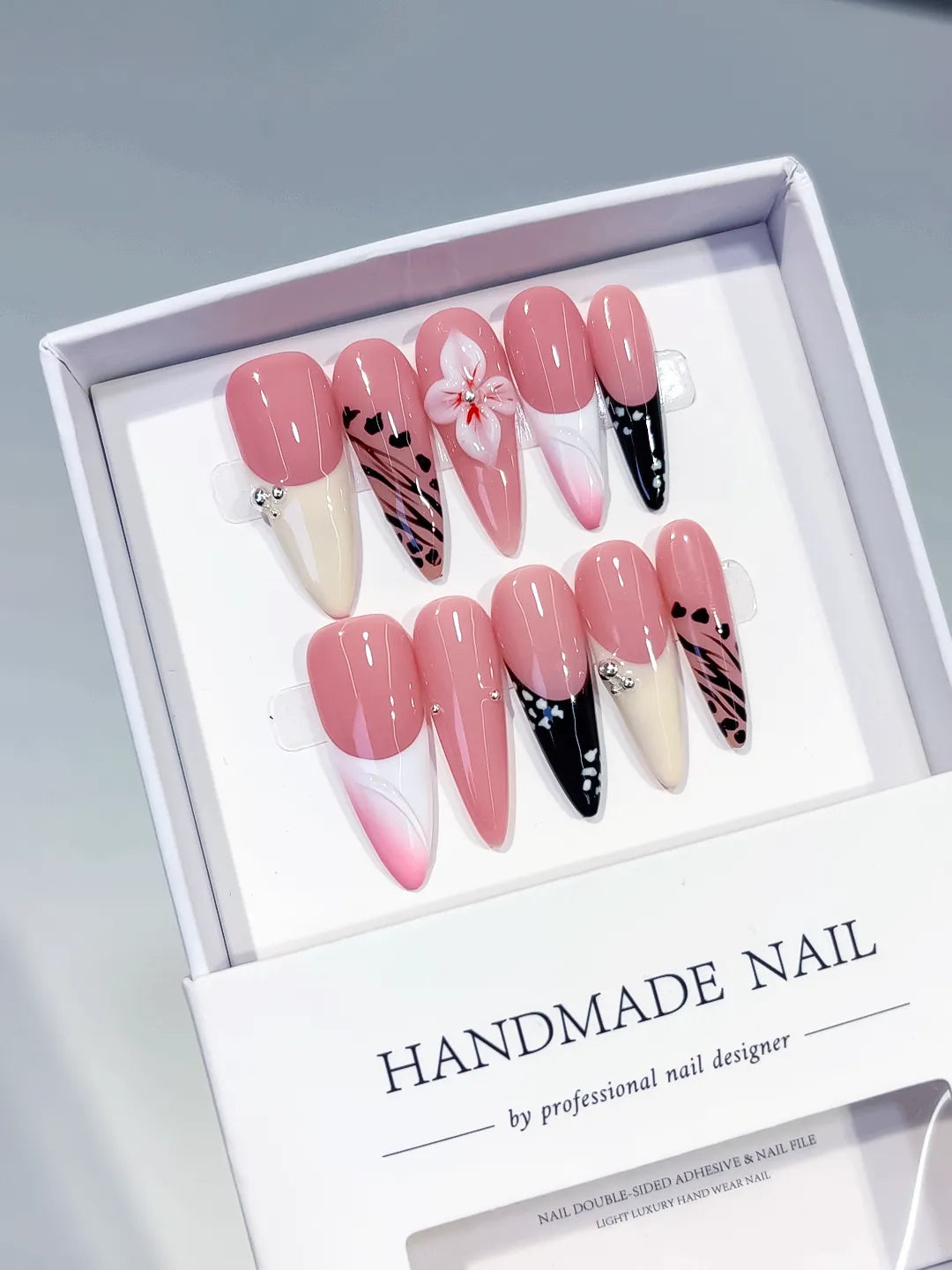 D562 - Long Pink White Stiletto Abstract Flower Animal Print