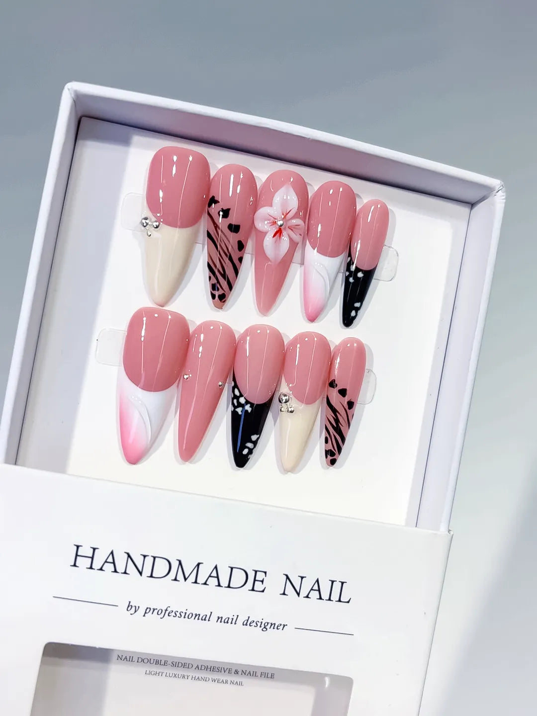 D562 - Long Pink White Stiletto Abstract Flower Animal Print