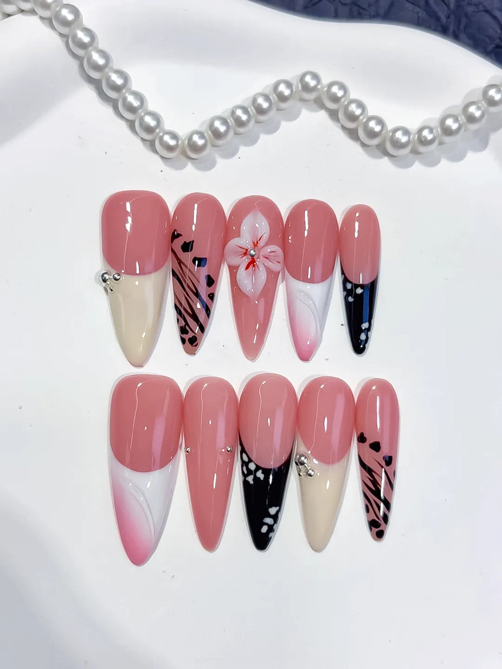 D562 - Long Pink White Stiletto Abstract Flower Animal Print