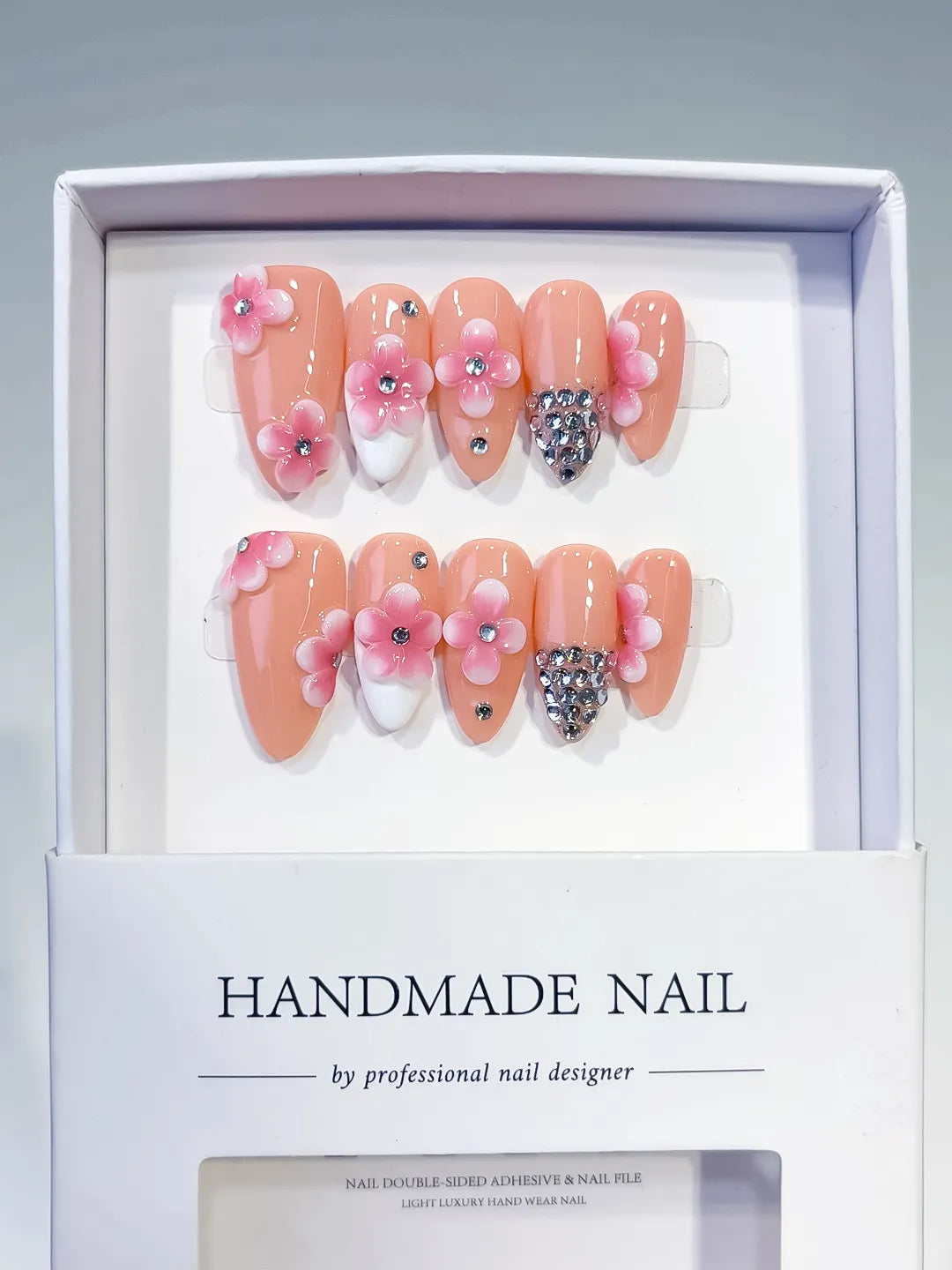 D564 - Medium Nude Pink Almond French tip Flower Rhinestone
