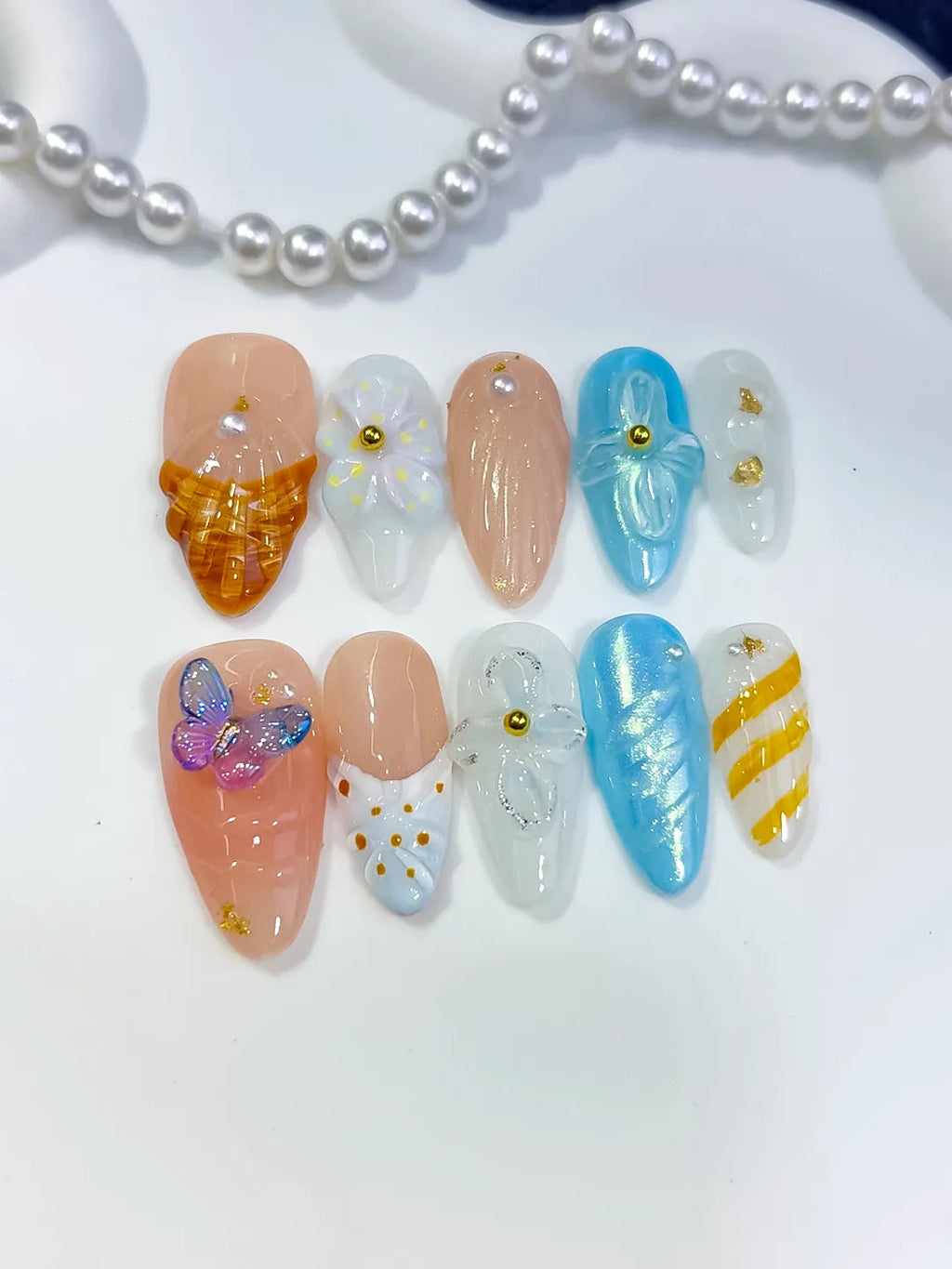 D575 - Medium Nude White Almond Abstract Flower Butterfly VibeNailsLab