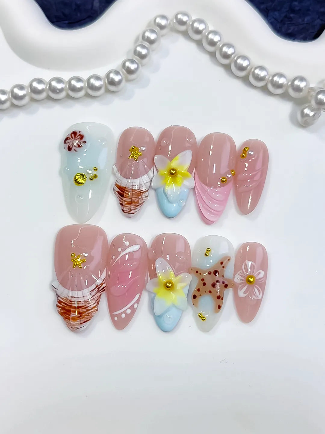 D581 - Medium Pink White Almond Abstract Flower Shell