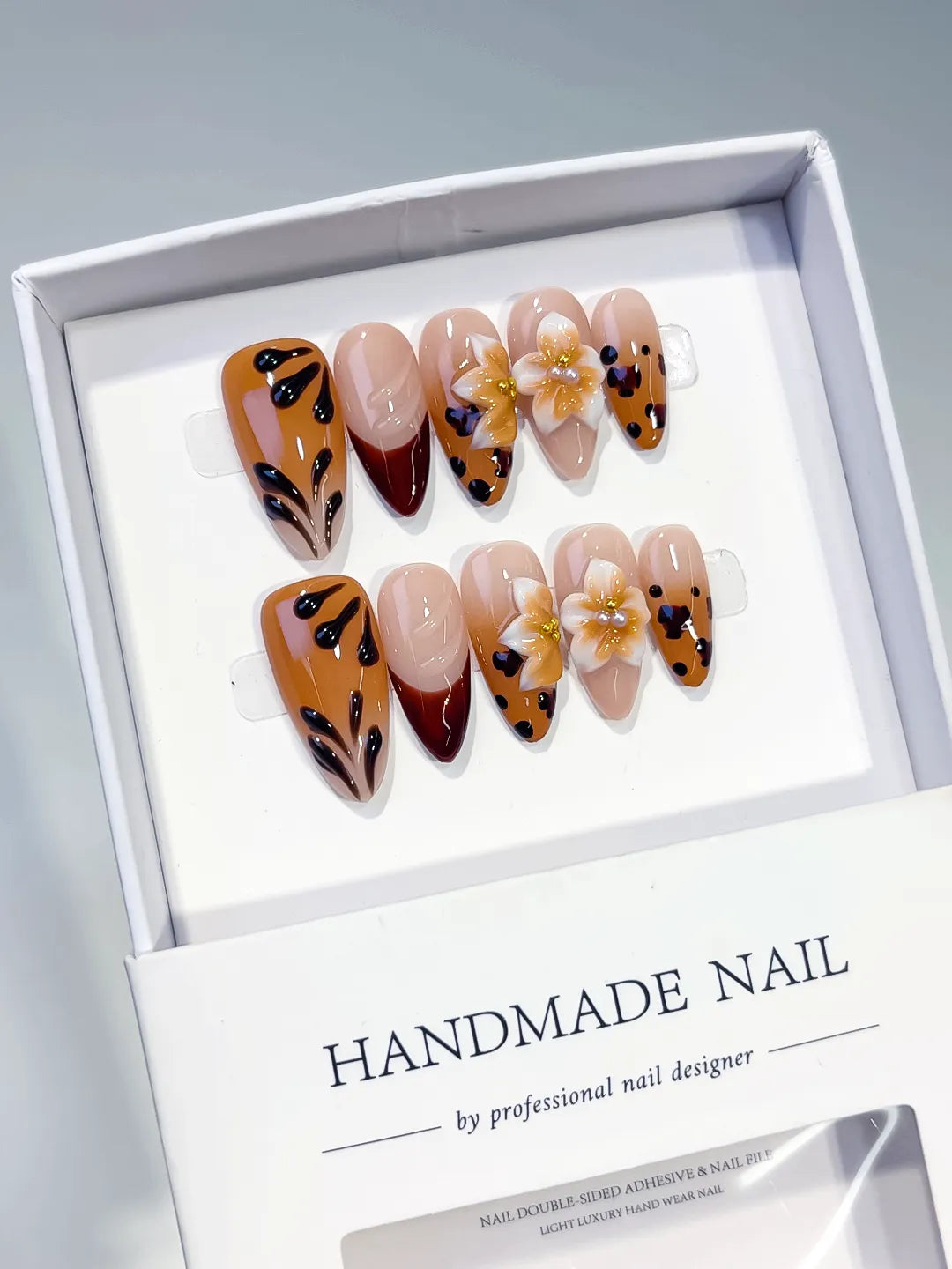 D584 - Medium Brown Red Almond Abstract Flower Animal Print