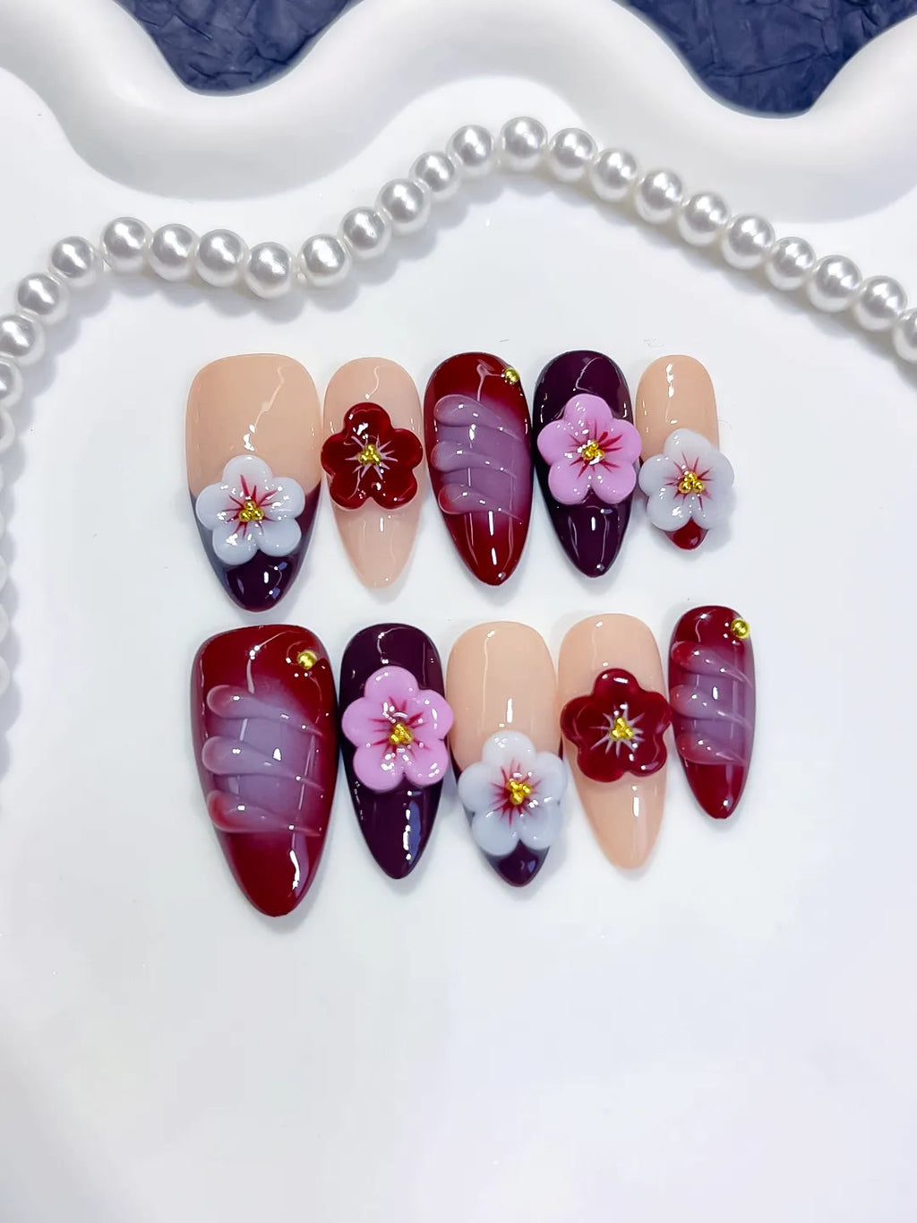 D597 - Medium Nude Red Almond Abstract Flower Shell