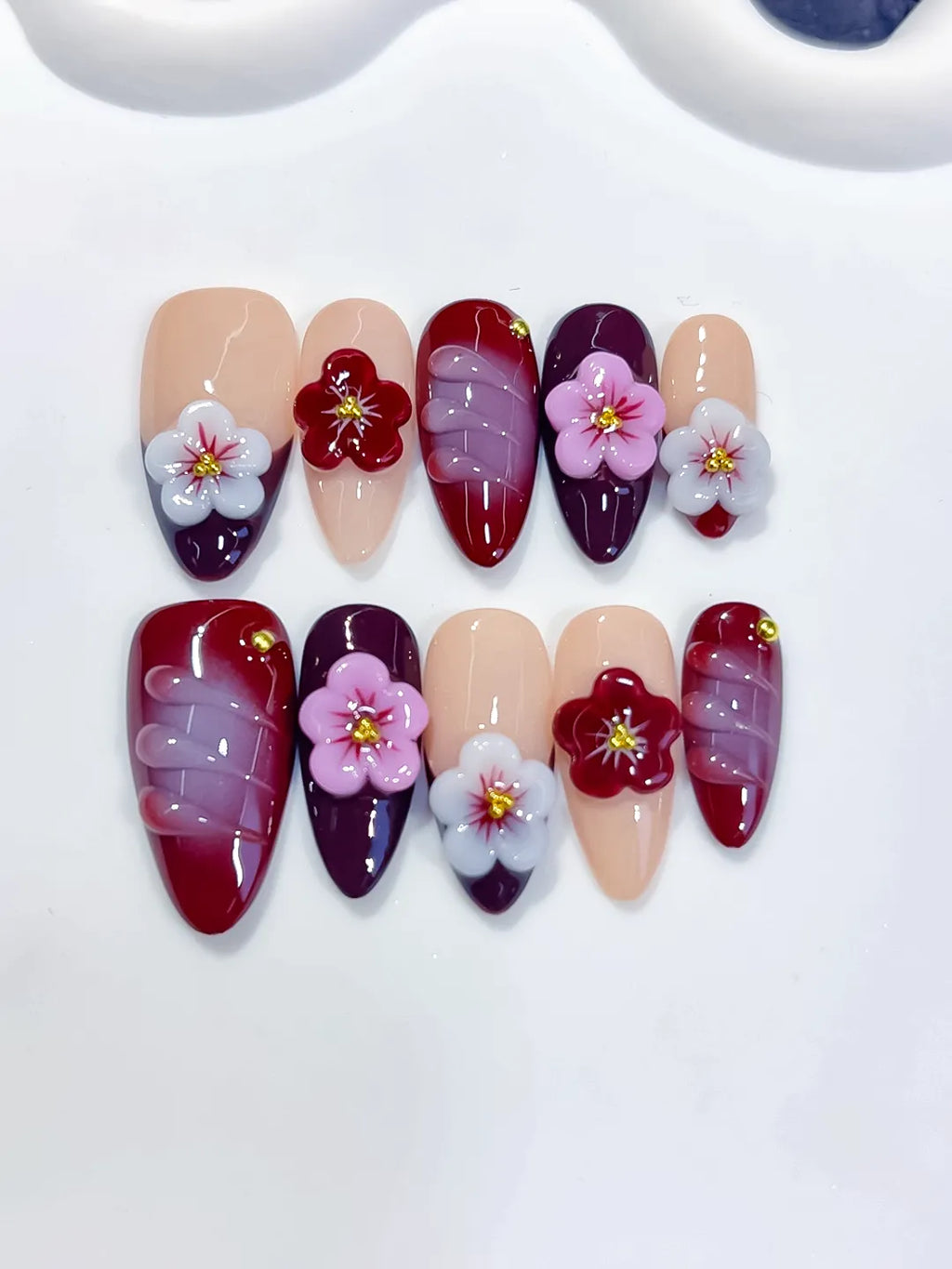 D597 - Medium Nude Red Almond Abstract Flower Shell