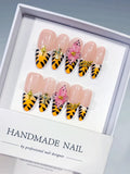 D600 - Long Nude Yellow Oval French tip Animal Print Bow VibeNailsLab