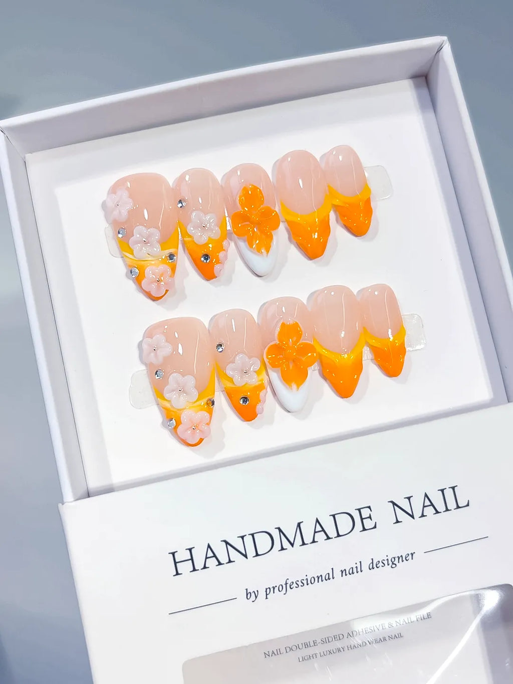 D604 - Medium Nude Orange Almond French tip Flower Rhinestone
