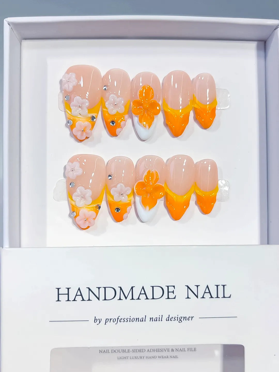 D604 - Medium Nude Orange Almond French tip Flower Rhinestone