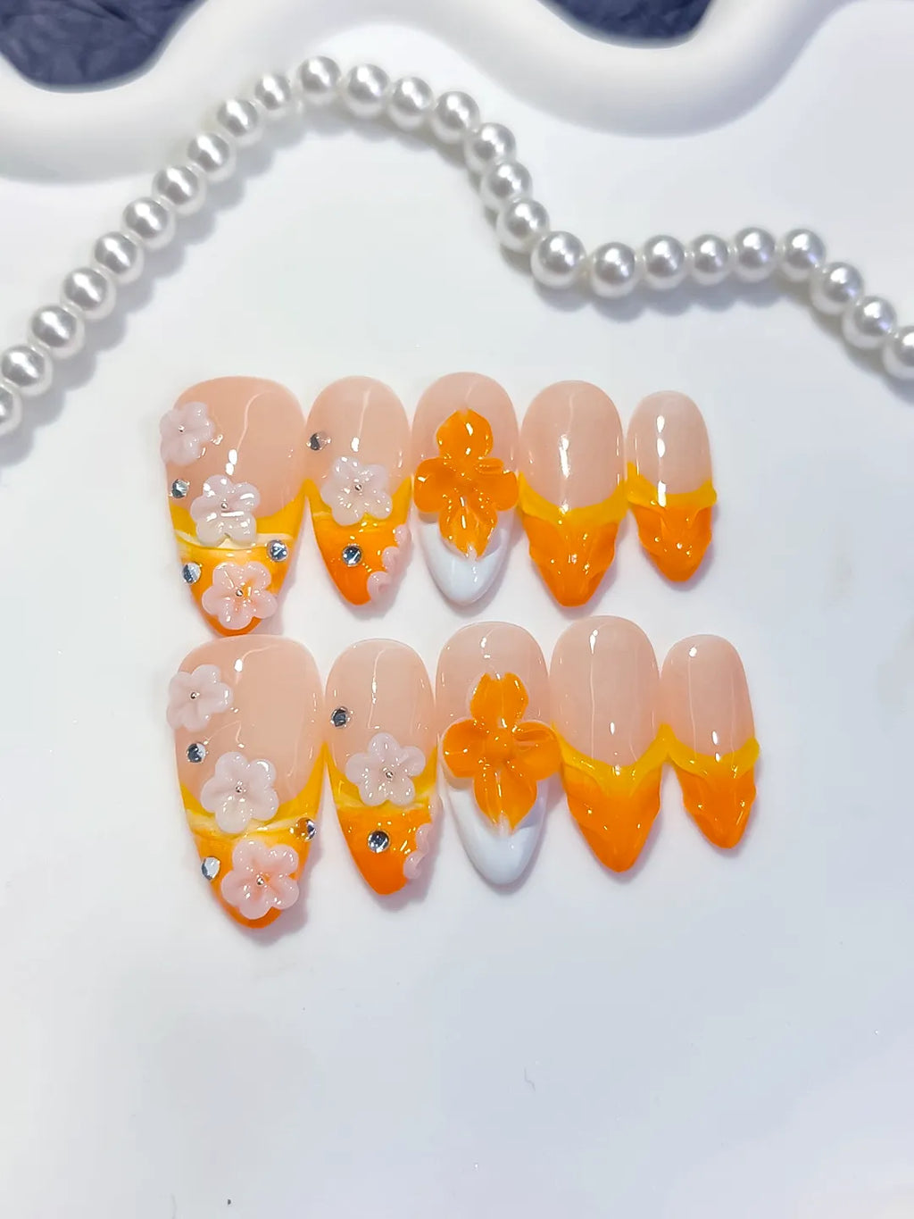 D604 - Medium Nude Orange Almond French tip Flower Rhinestone