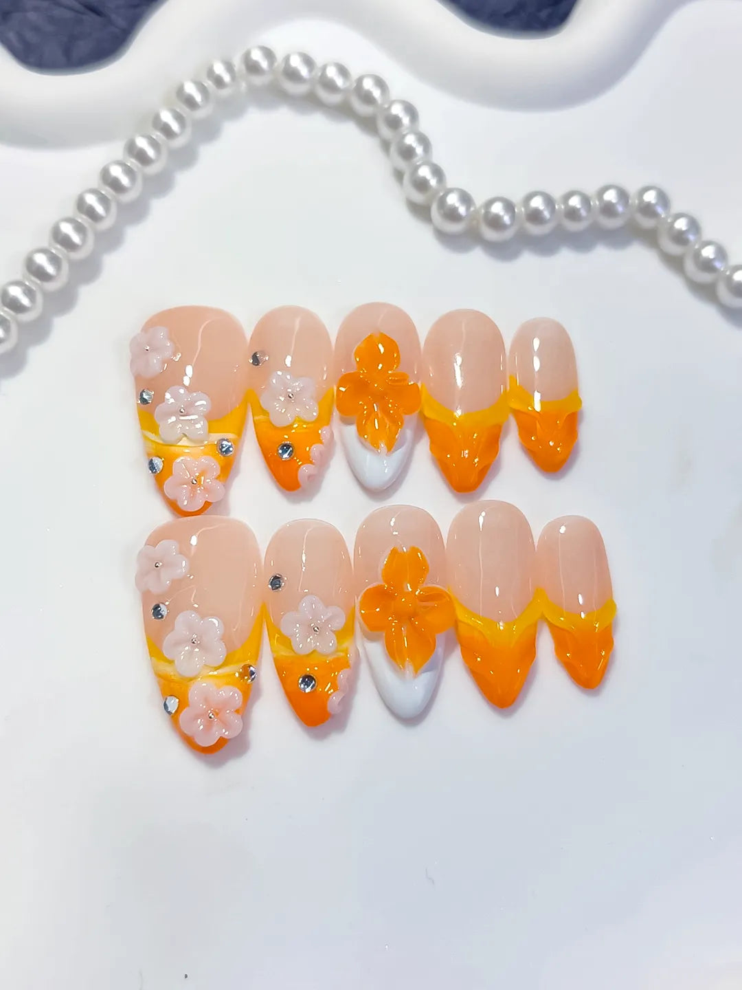 D604 - Medium Nude Orange Almond French tip Flower Rhinestone