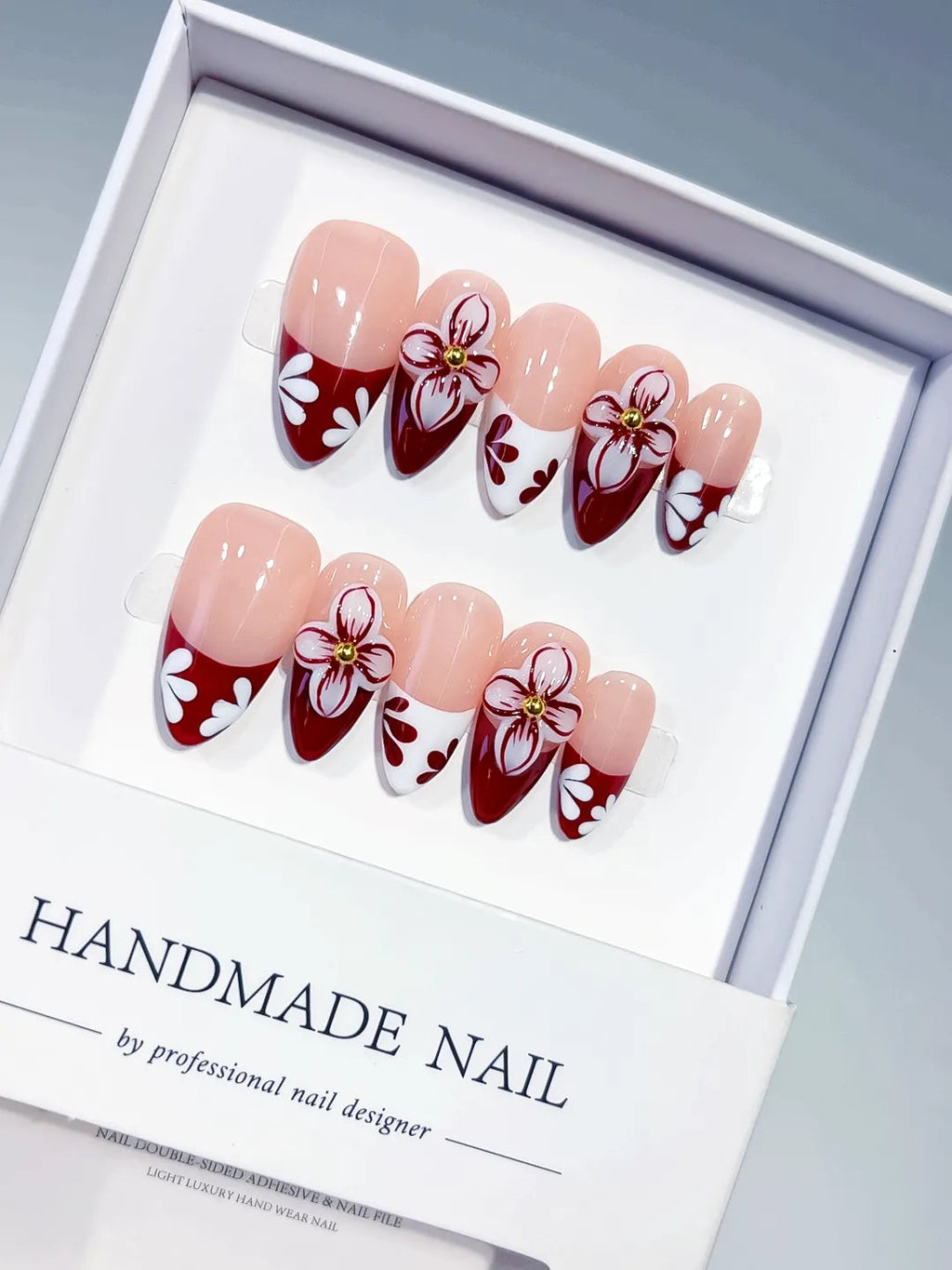 D606 - Medium Nude Red Almond French tip Flower VibeNailsLab