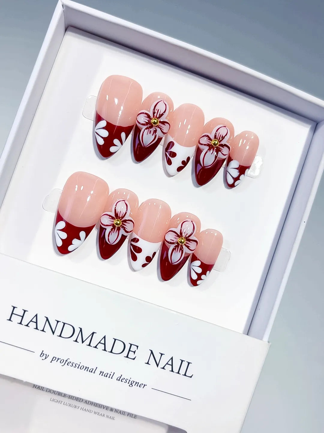 D606 - Medium Nude Red Almond French tip Flower VibeNailsLab