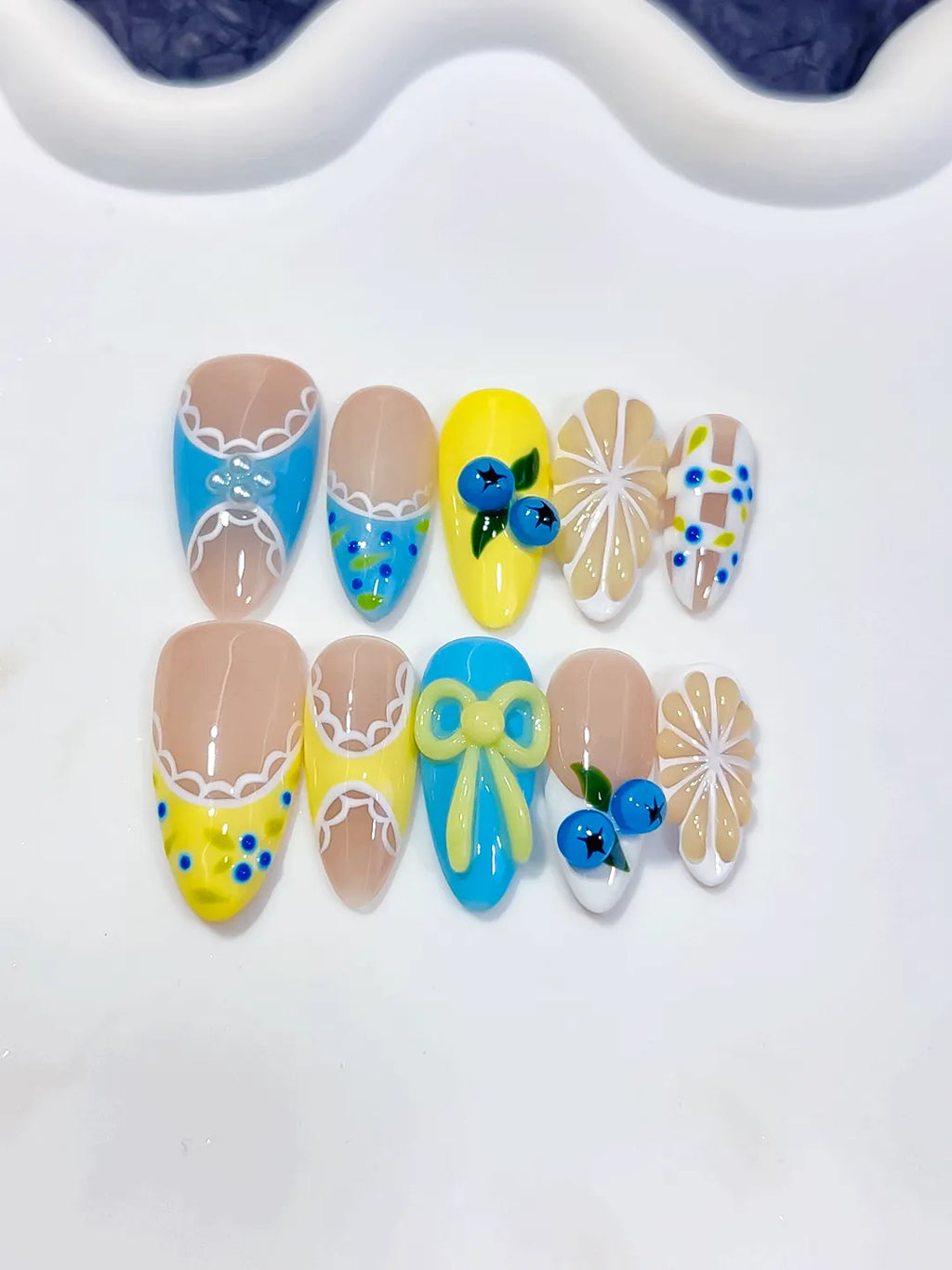 D607 - Medium Nude Yellow Almond Abstract Fruit Bow