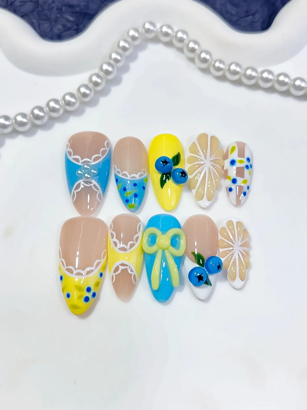 D607 - Medium Nude Yellow Almond Abstract Fruit Bow