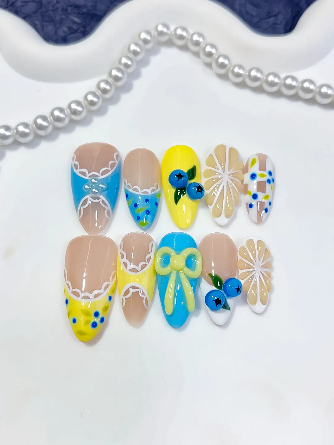D607 - Medium Nude Yellow Almond Abstract Fruit Bow