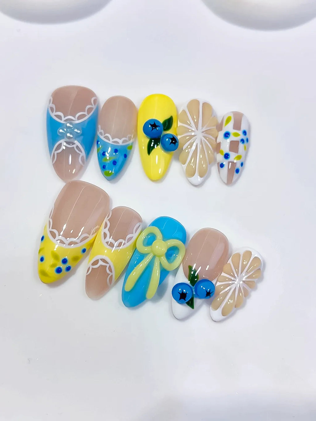 D607 - Medium Nude Yellow Almond Abstract Fruit Bow