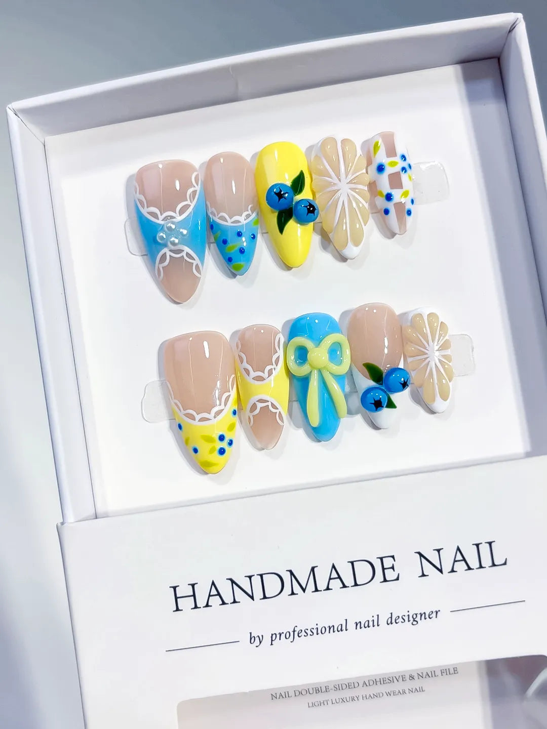 D607 - Medium Nude Yellow Almond Abstract Fruit Bow