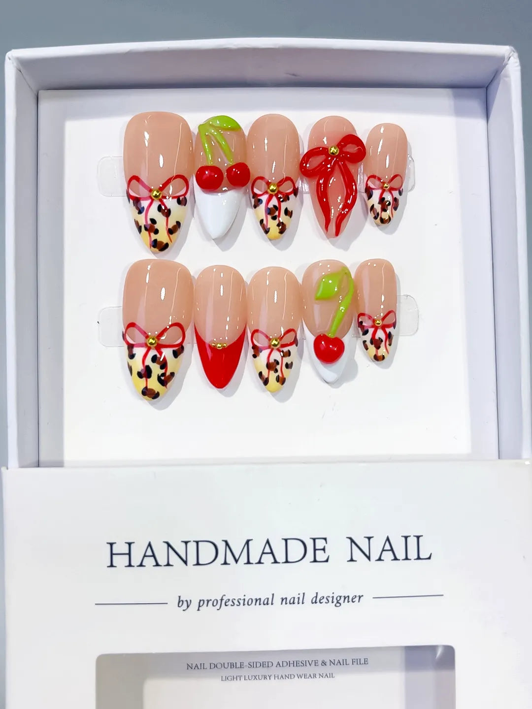 D609 - Medium Nude Red Almond Abstract Bow Cherry VibeNailsLab