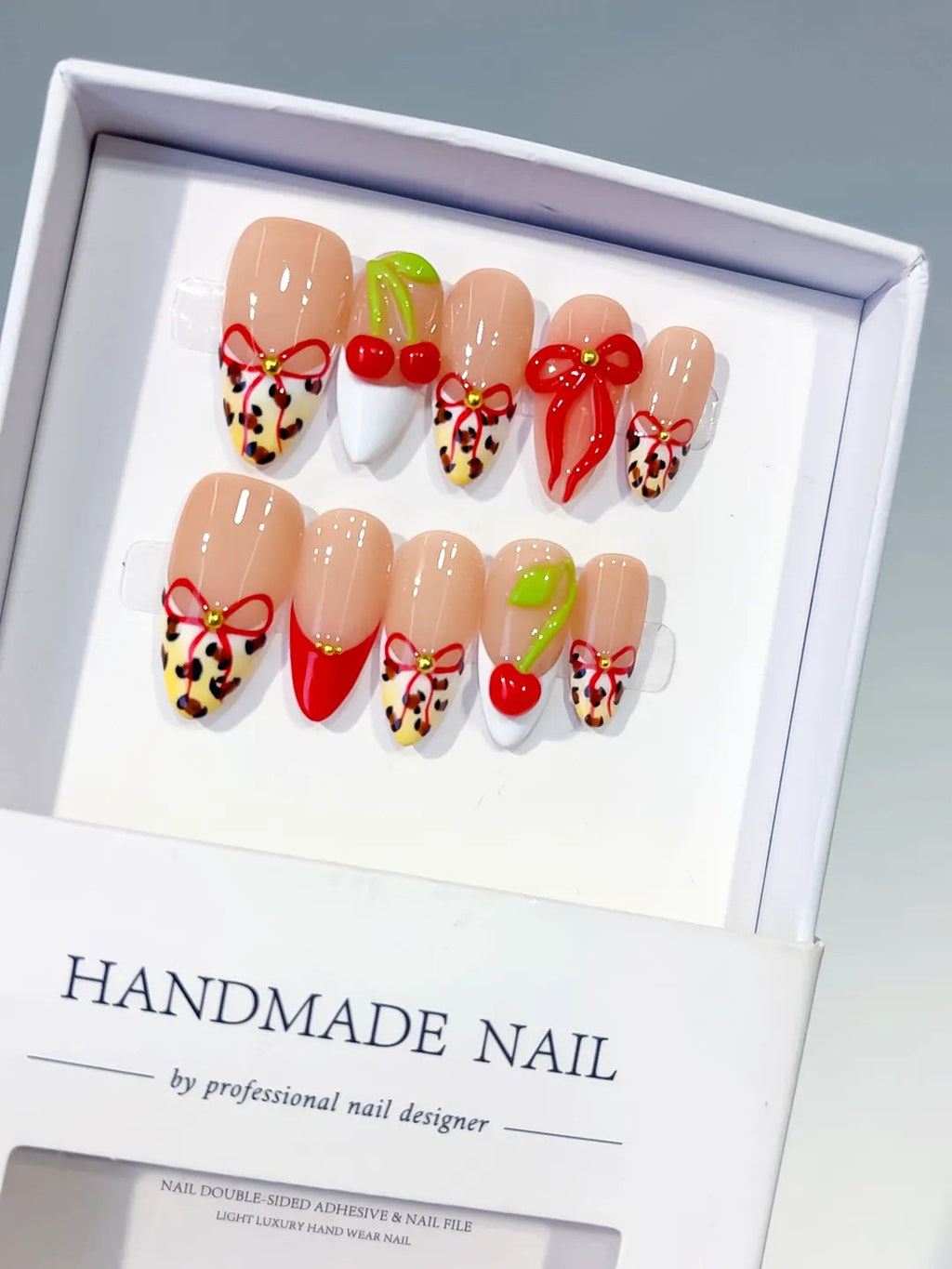 D609 - Medium Nude Red Almond Abstract Bow Cherry VibeNailsLab