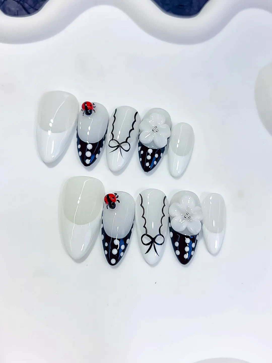 D611 - Medium White Black Almond French tip Flower Ladybug