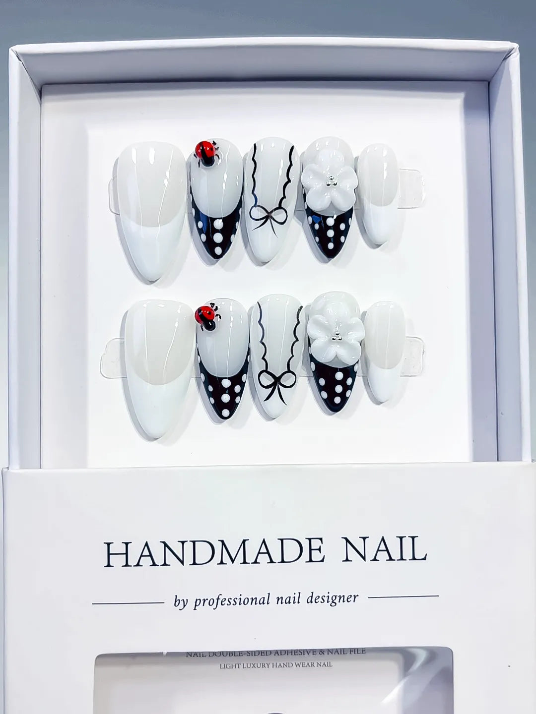 D611 - Medium White Black Almond French tip Flower Ladybug