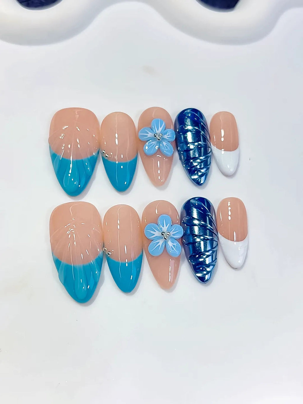 D613 - Medium Nude Blue Almond French tip Flower Cat Eye VibeNailsLab