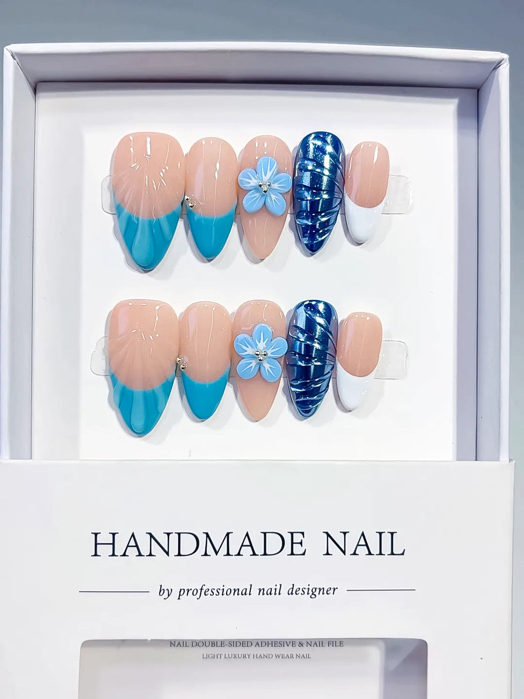 D613 - Medium Nude Blue Almond French tip Flower Cat Eye VibeNailsLab