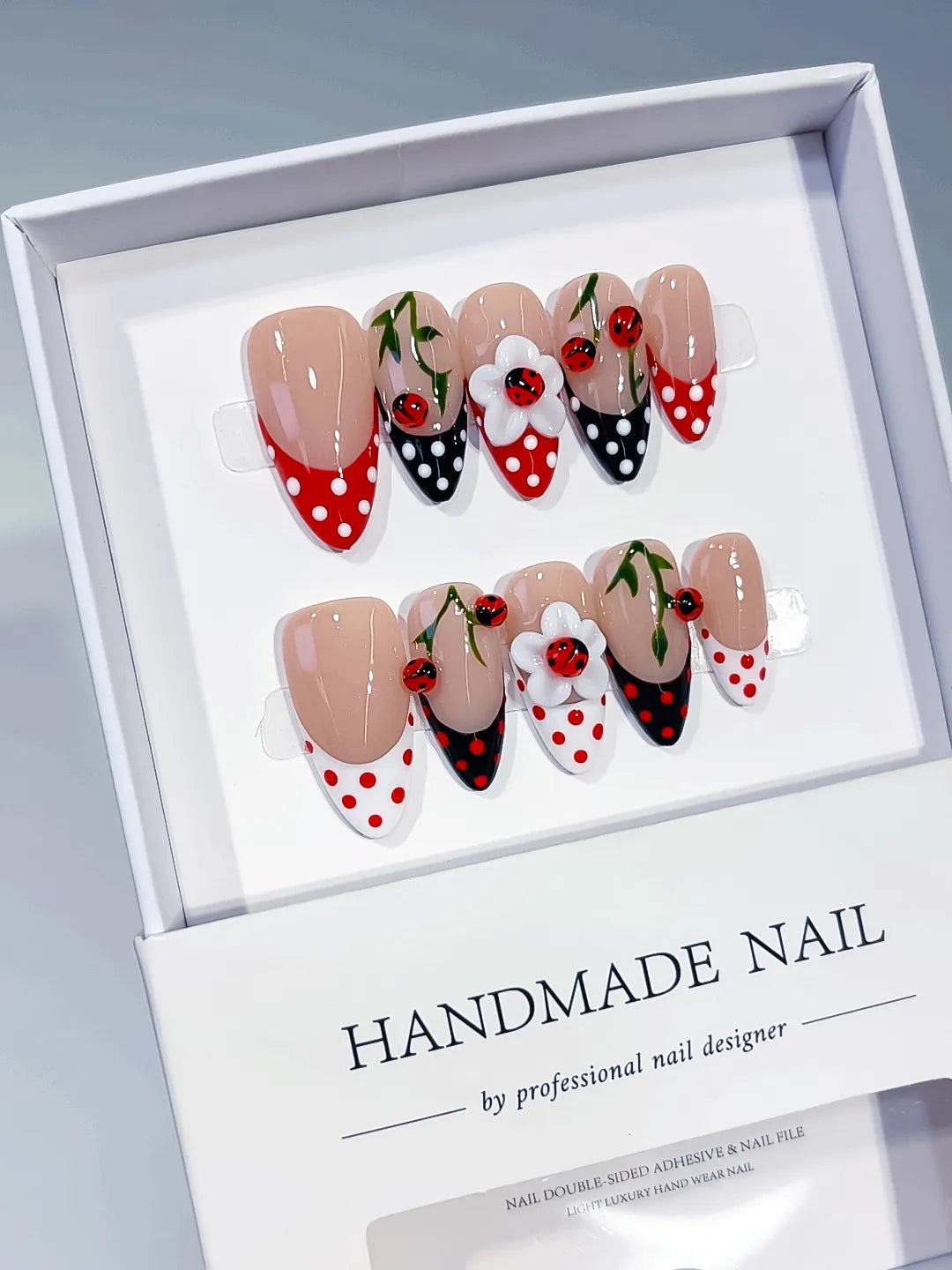 D617 - Medium Nude Red Almond French tip Cherry Dot Pattern