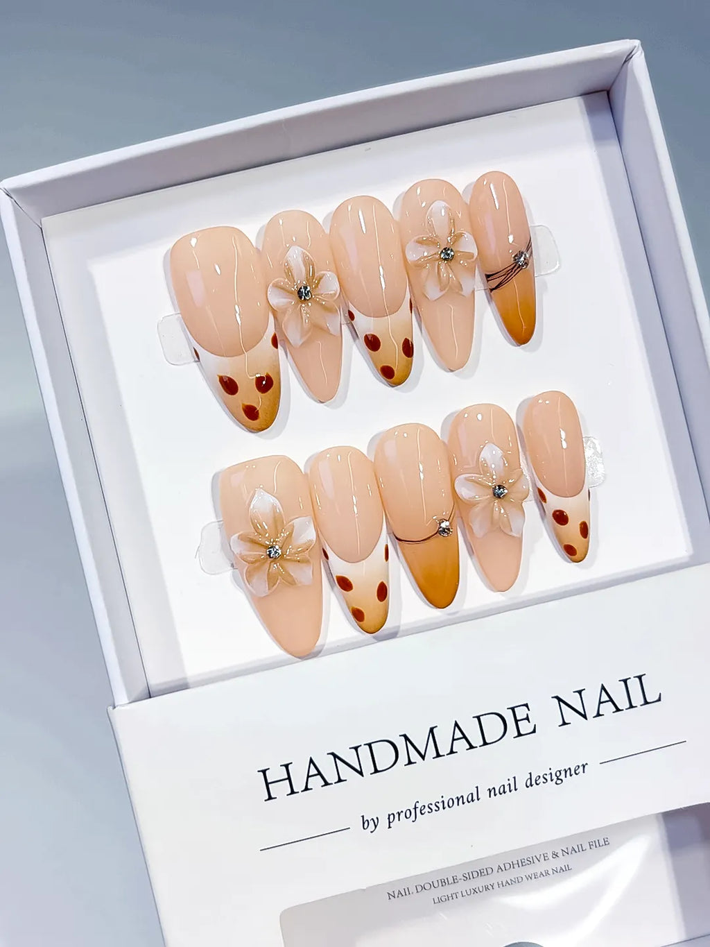 D618 - Long Nude Brown Oval French tip Flower Dot Pattern