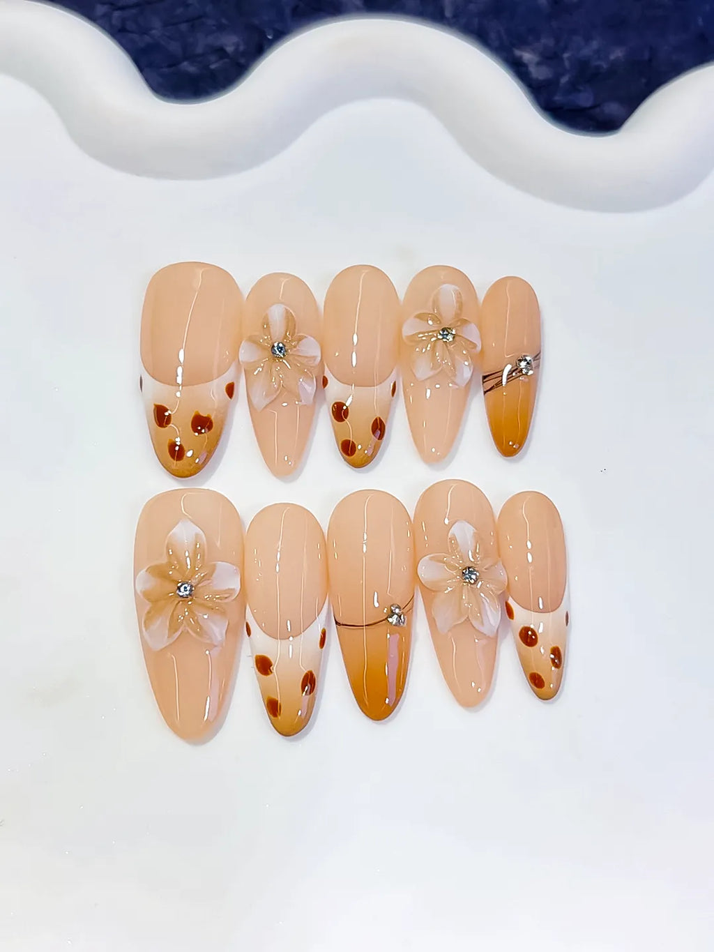 D618 - Long Nude Brown Oval French tip Flower Dot Pattern