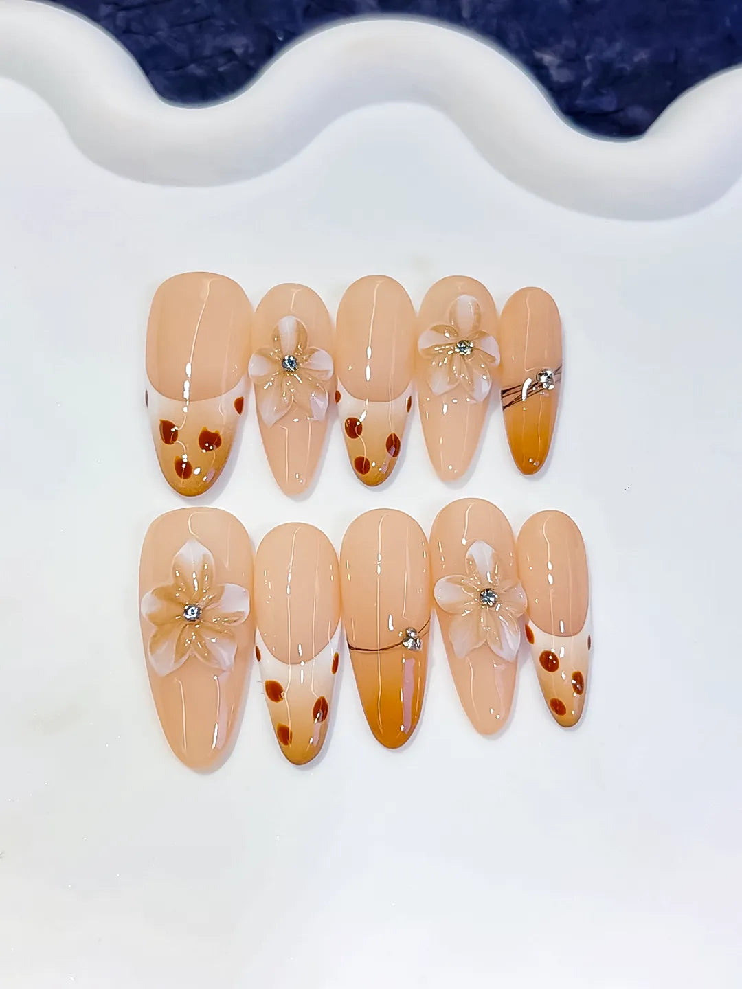 D618 - Long Nude Brown Oval French tip Flower Dot Pattern