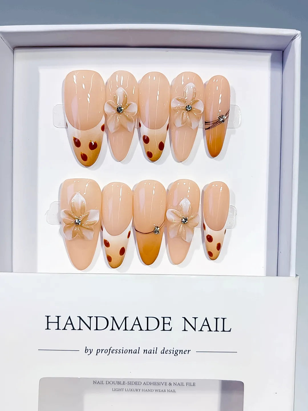 D618 - Long Nude Brown Oval French tip Flower Dot Pattern