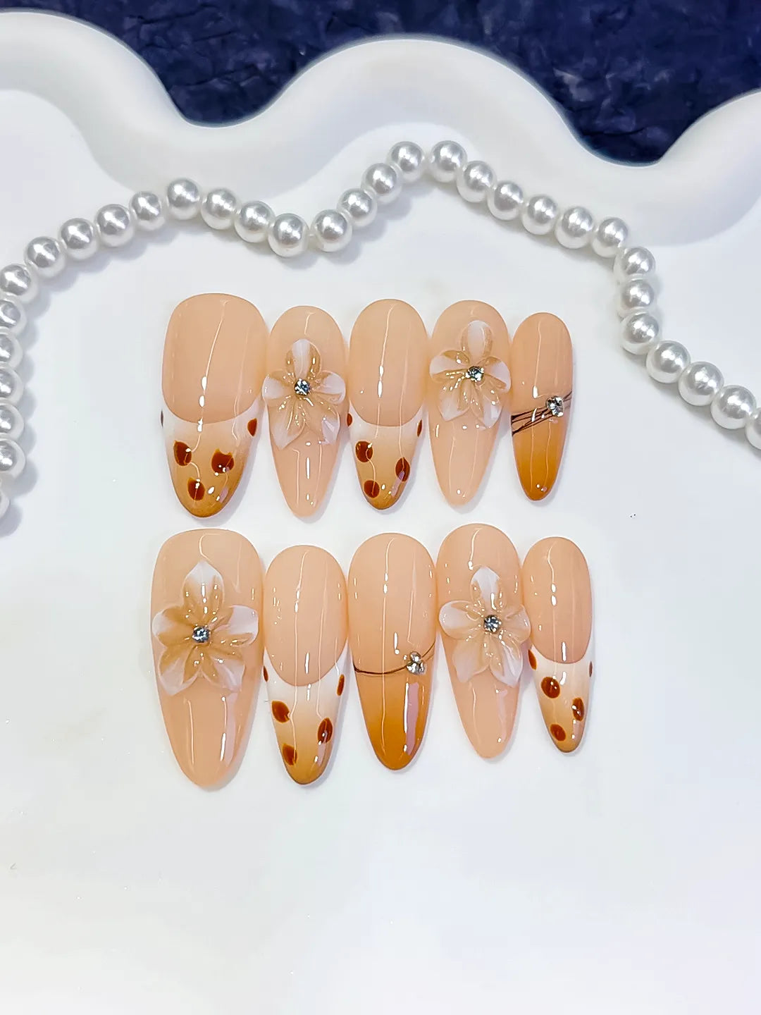 D618 - Long Nude Brown Oval French tip Flower Dot Pattern