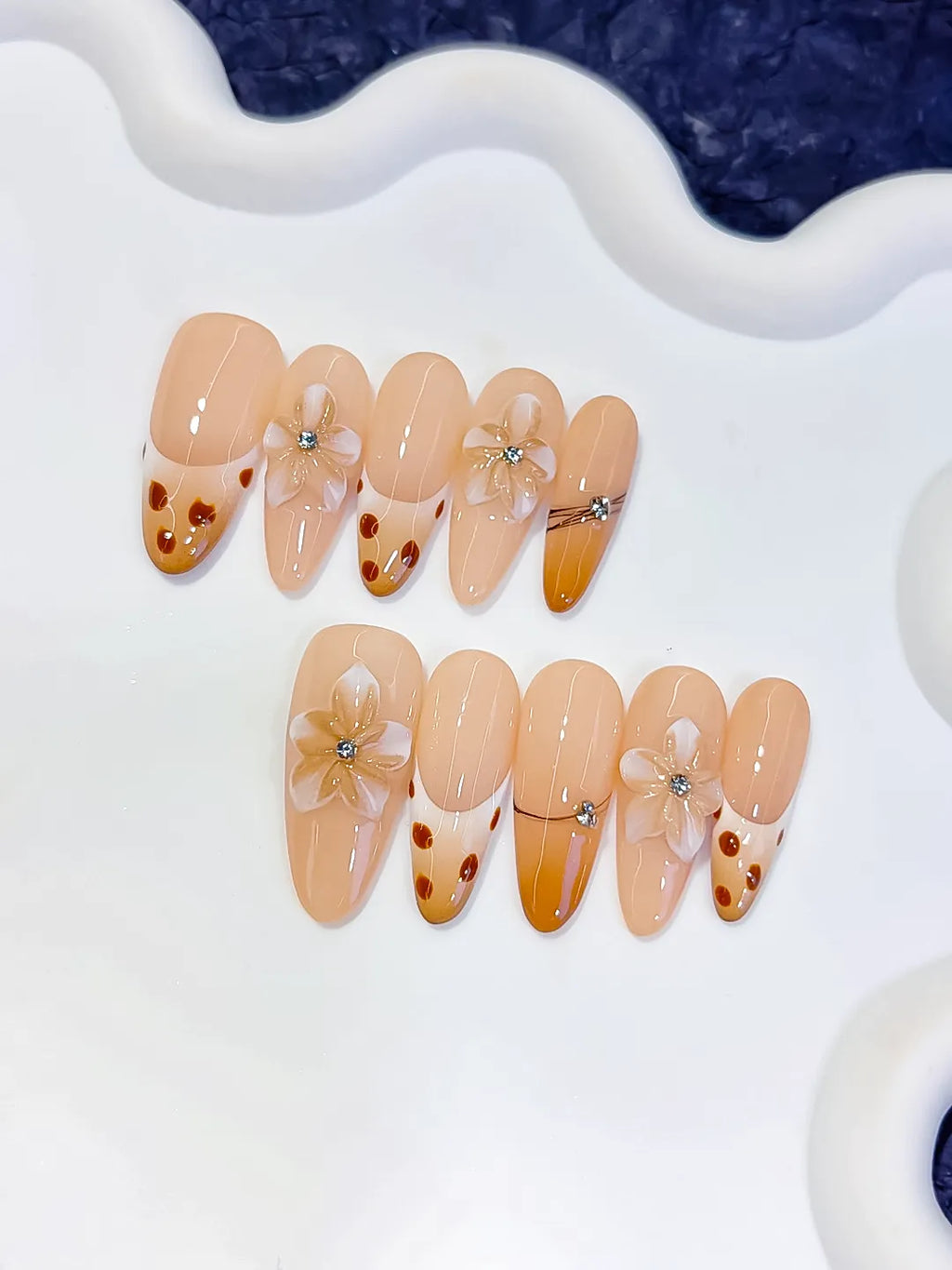 D618 - Long Nude Brown Oval French tip Flower Dot Pattern