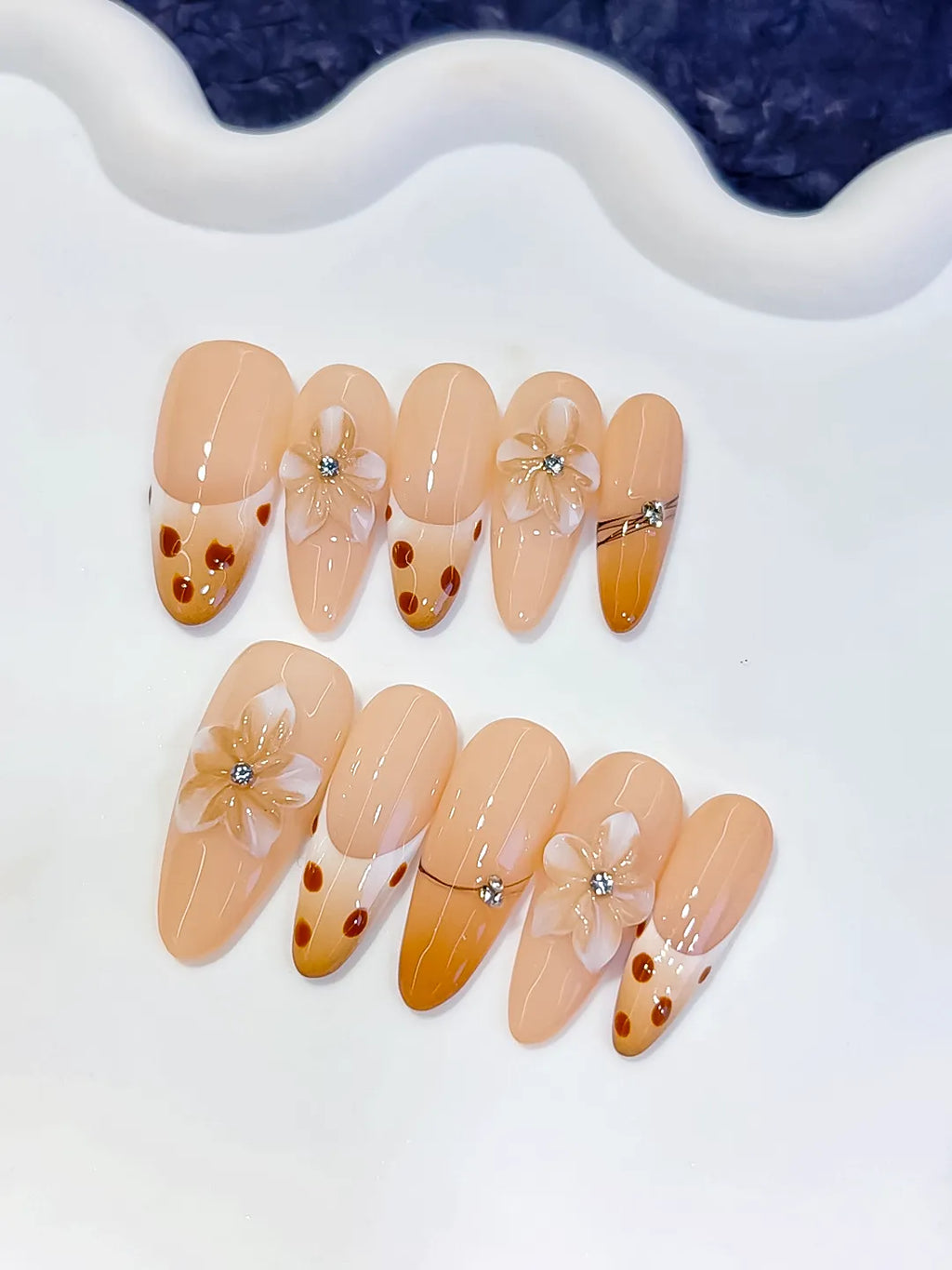 D618 - Long Nude Brown Oval French tip Flower Dot Pattern