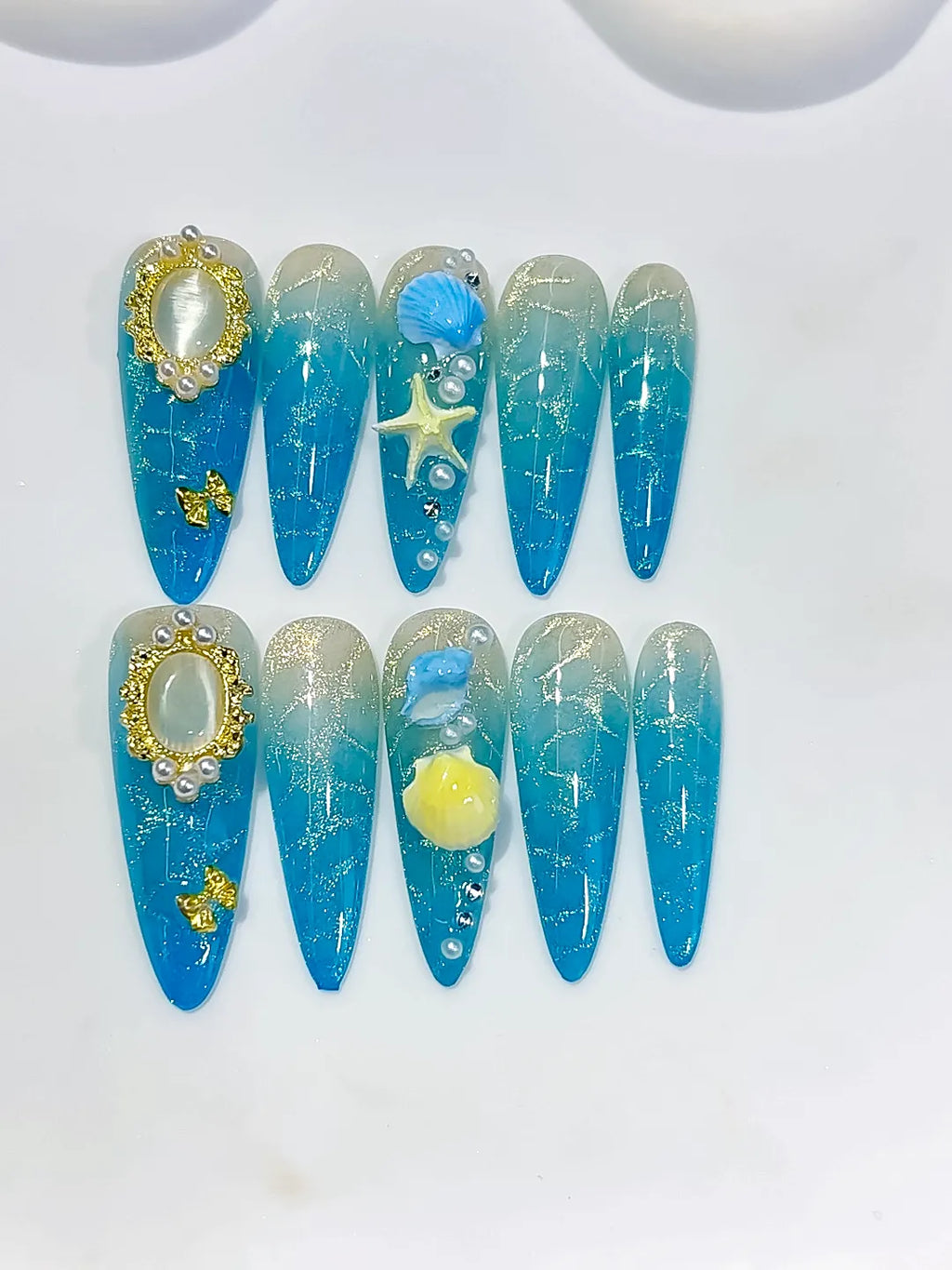 D625 - Long Blue Silver Stiletto Glitter Pearl Star