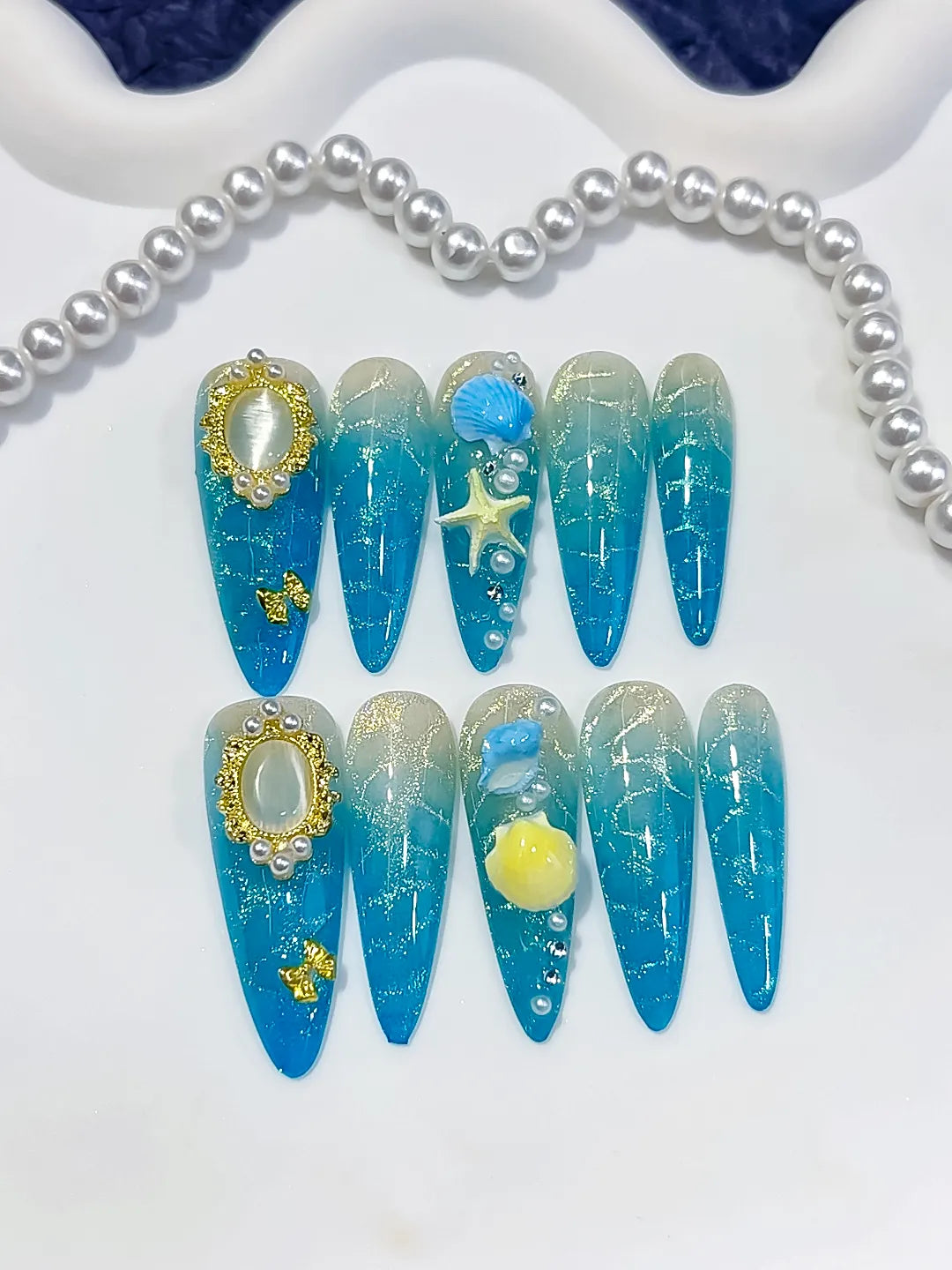 D625 - Long Blue Silver Stiletto Glitter Pearl Star