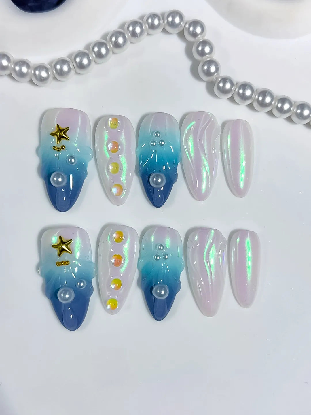 D637 - Medium Blue White Almond Holographic Pearl Star