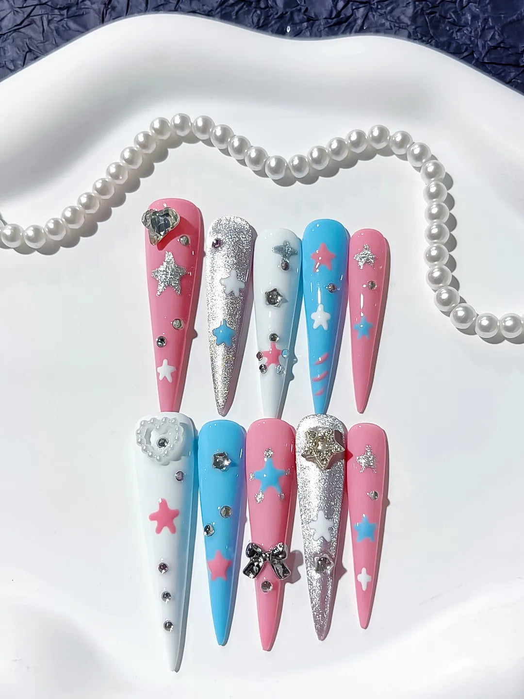 JSA23 - Long Pink Blue Stiletto Abstract Star Bow