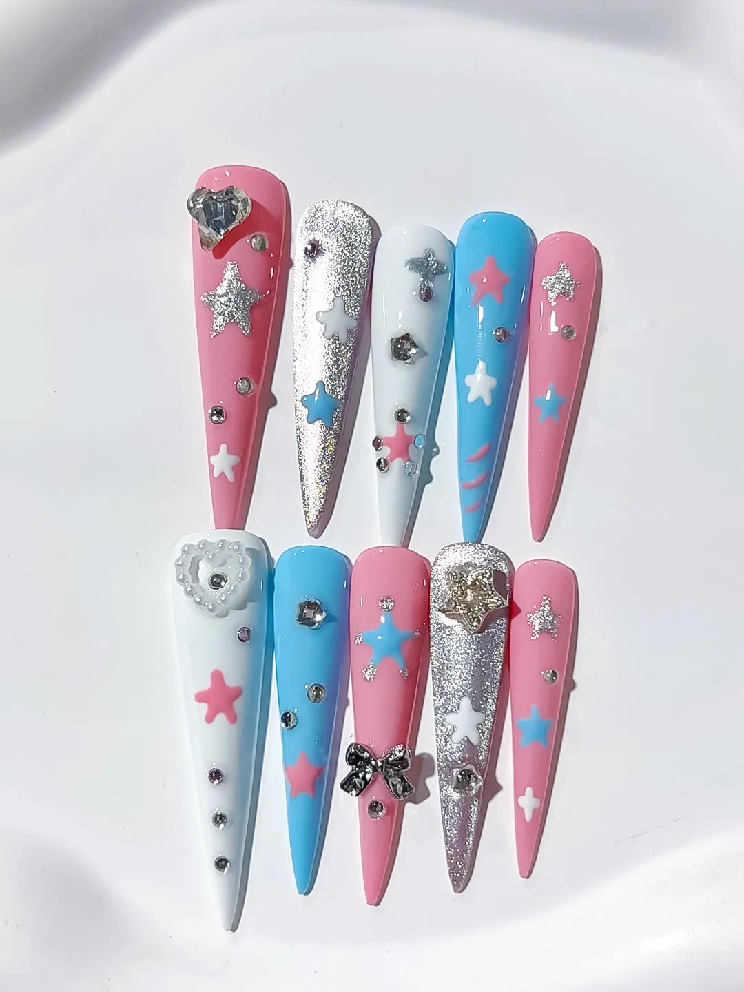 JSA23 - Long Pink Blue Stiletto Abstract Star Bow