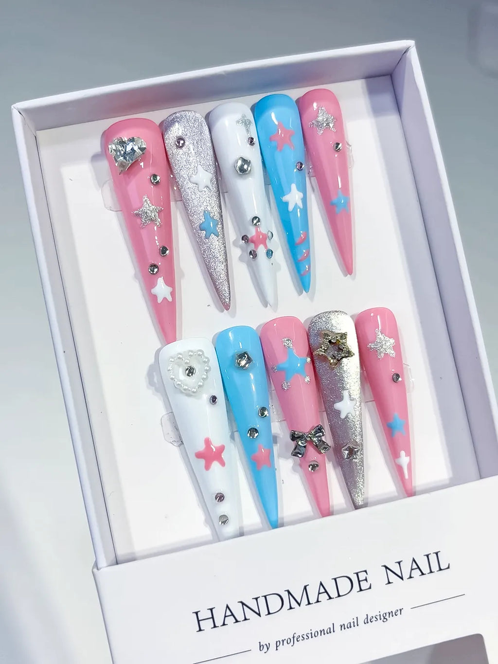 JSA23 - Long Pink Blue Stiletto Abstract Star Bow