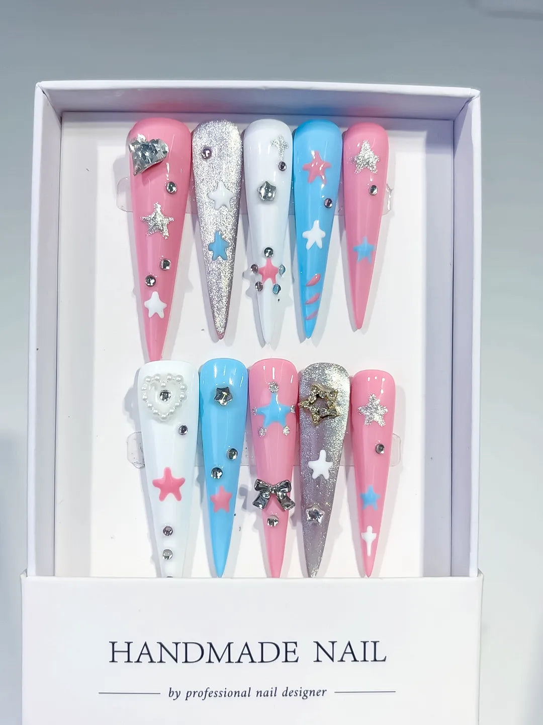 JSA23 - Long Pink Blue Stiletto Abstract Star Bow