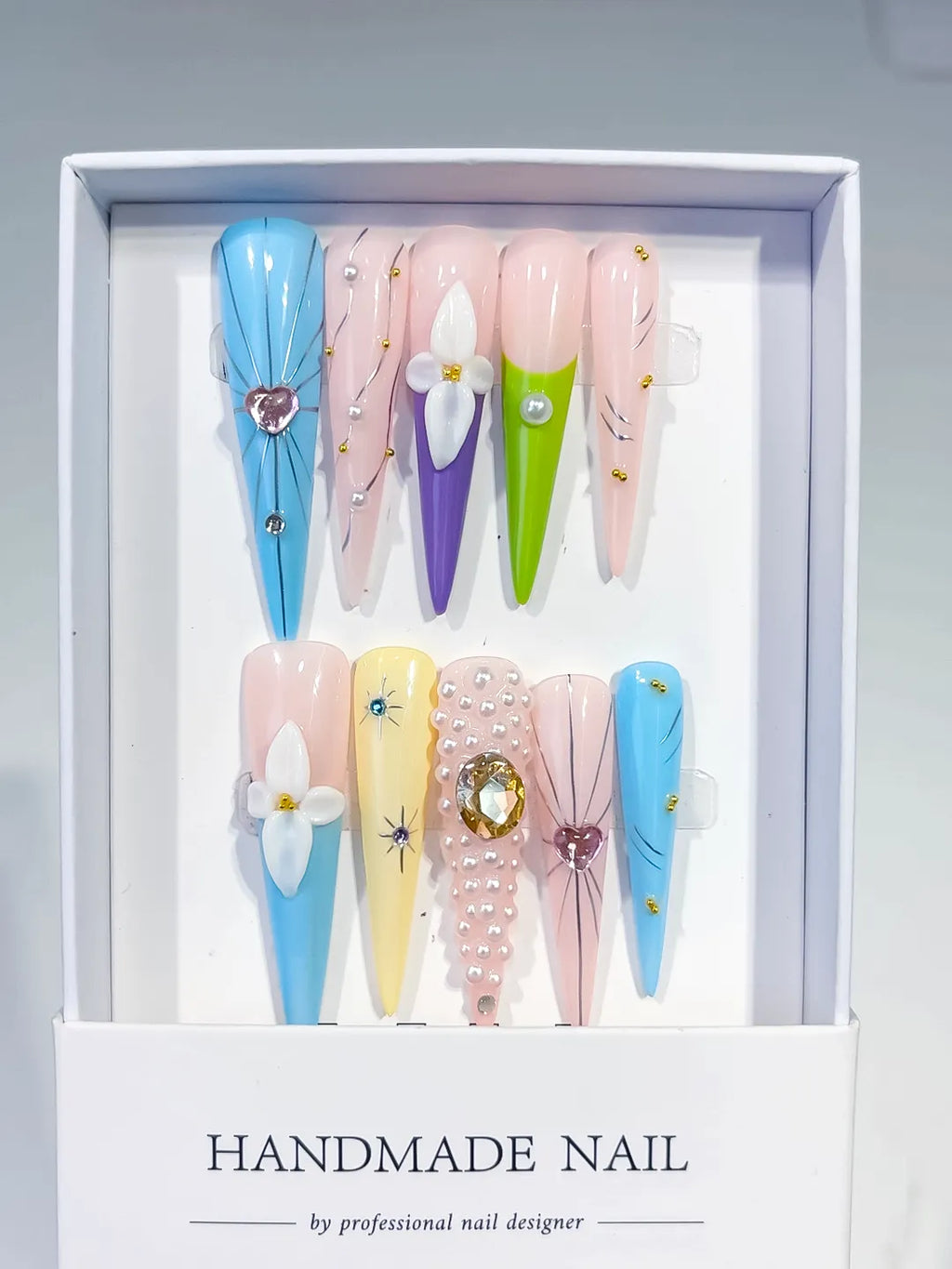 JSA30 - Long Blue Nude Stiletto Abstract Flower Pearl