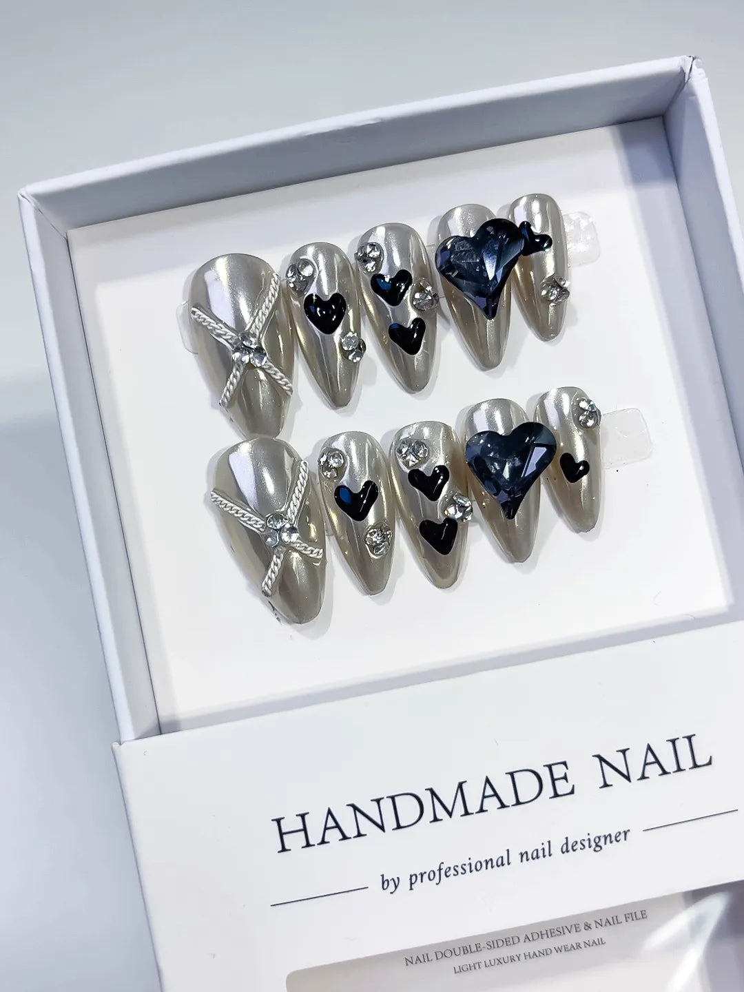 K013 - Medium Silver Black Almond Metallic Heart Bow