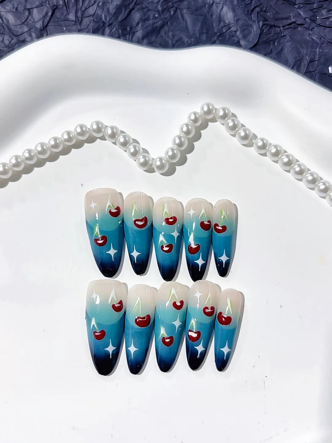 K014 - Long Blue Nude Oval Floral Cherry Star
