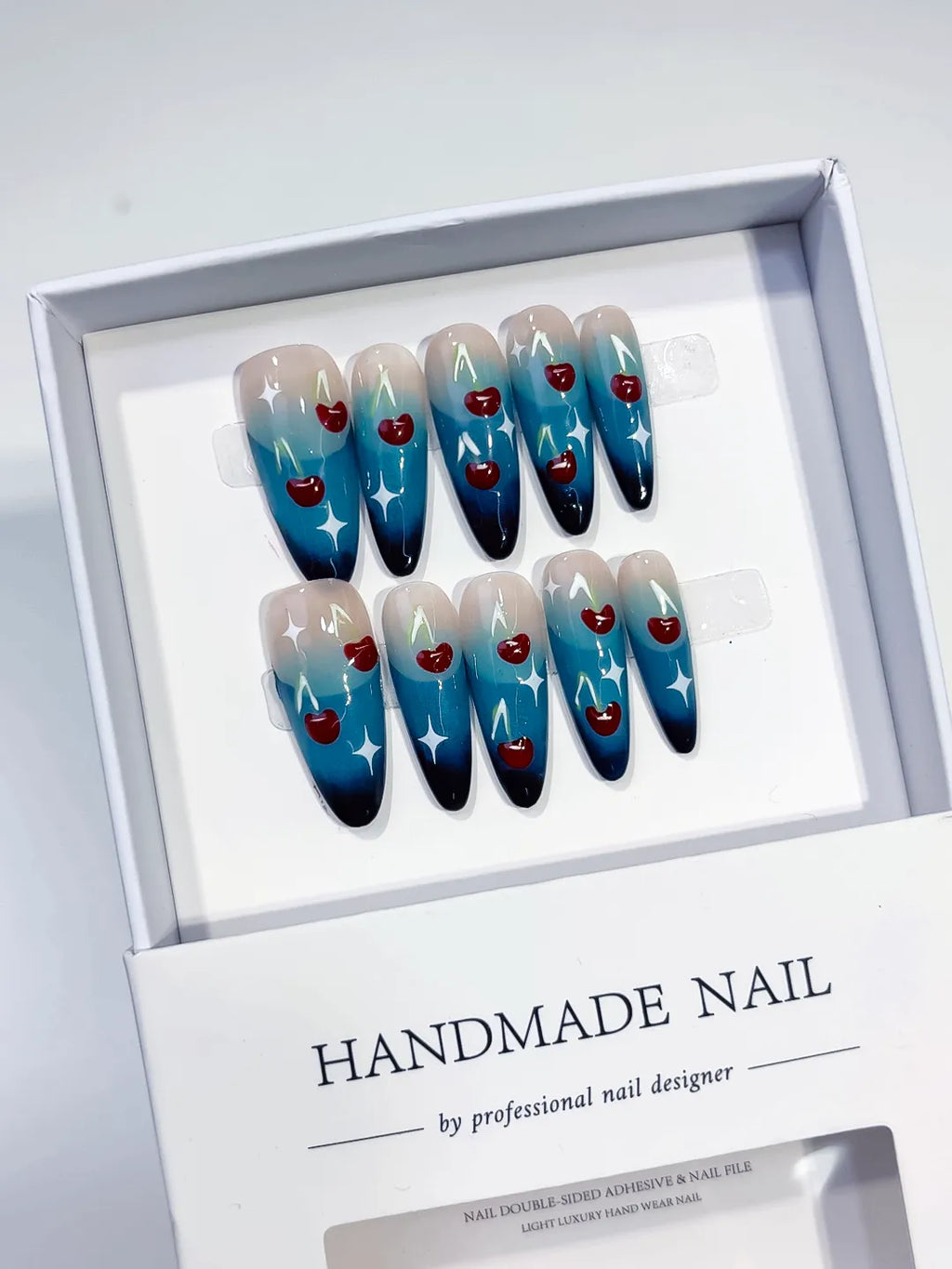 K014 - Long Blue Nude Oval Floral Cherry Star