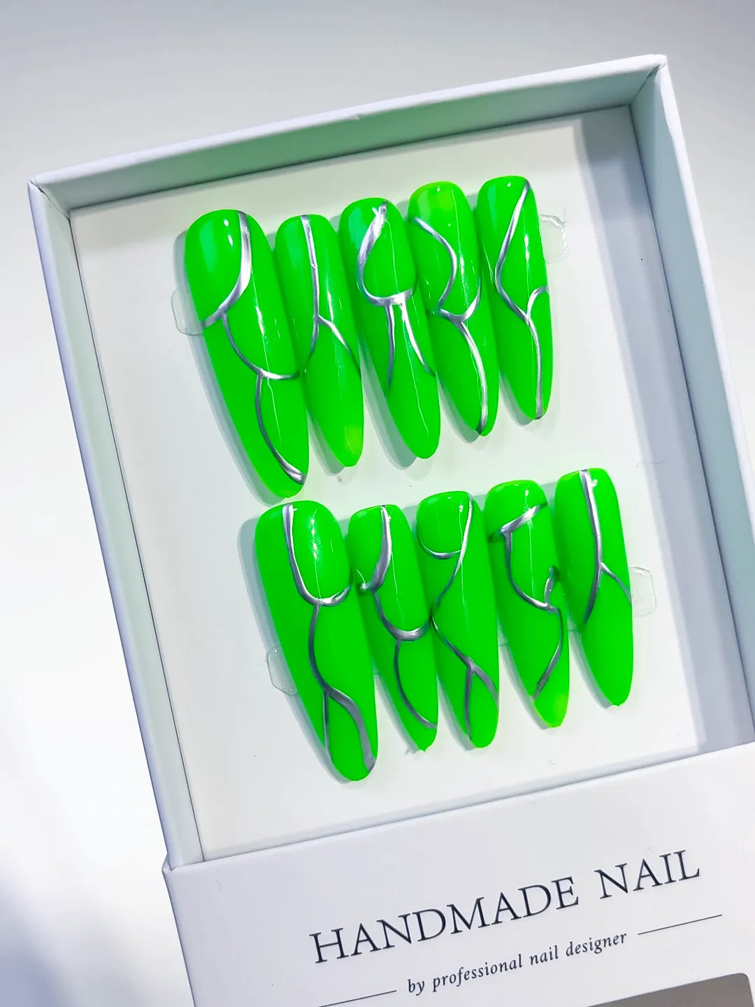 K016 - Long Green Silver Oval Abstract Metallic Accent