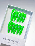 K016 - Long Green Silver Oval Abstract Metallic Accent
