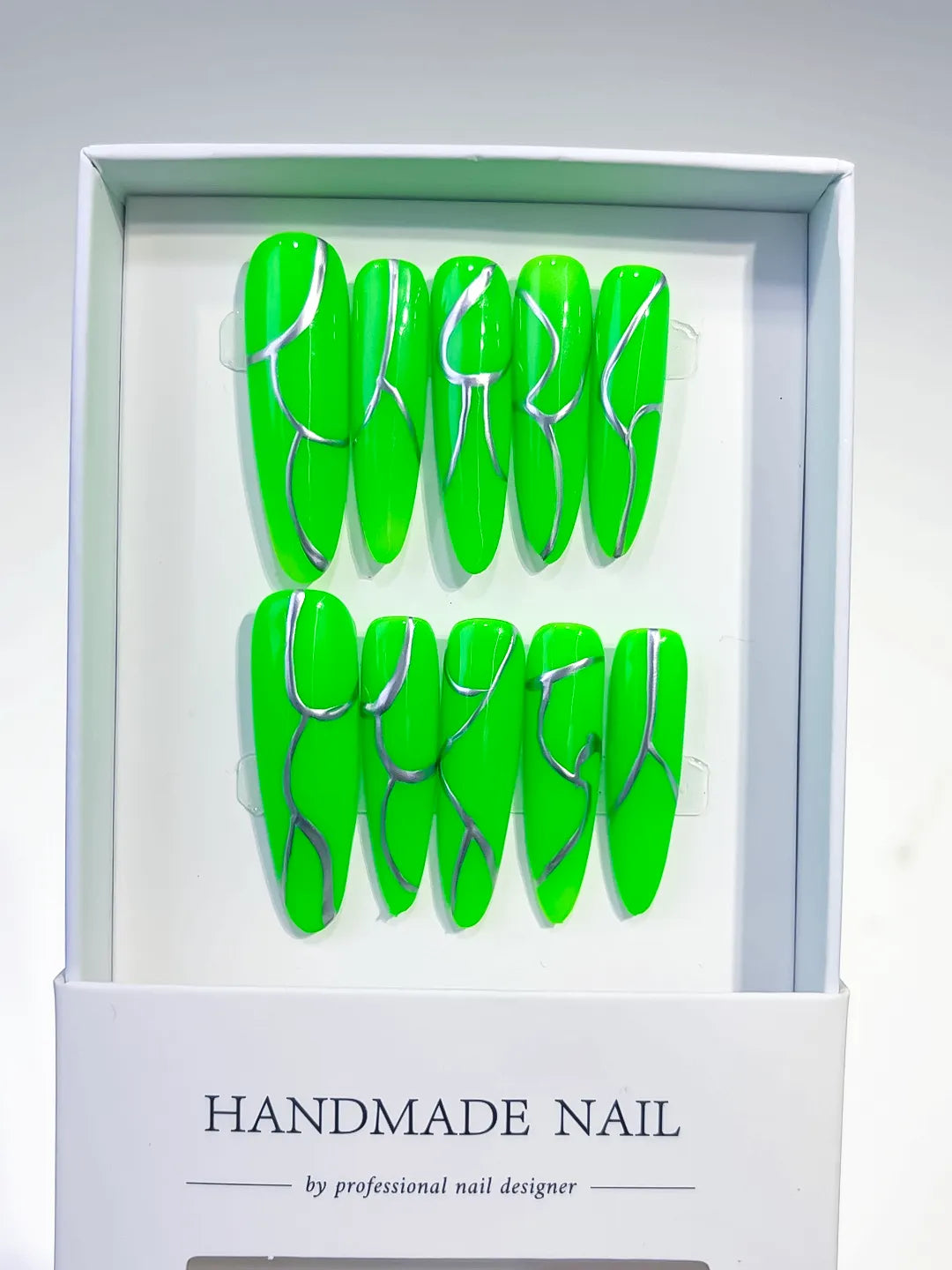 K016 - Long Green Silver Oval Abstract Metallic Accent